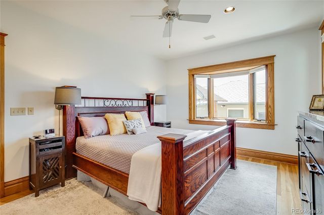 a bathroom with a sink vanity granite and a mirror