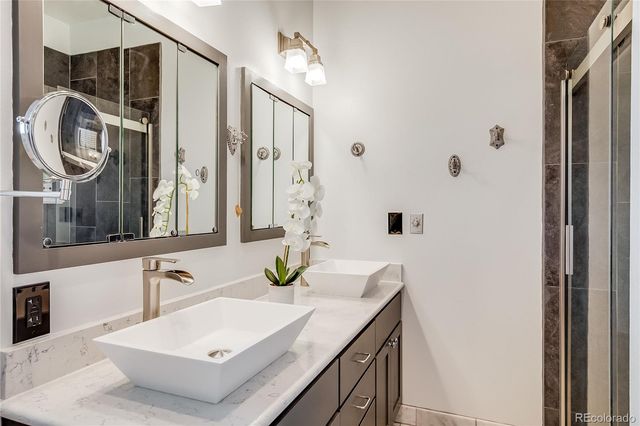 a bedroom with a large bed and a closet