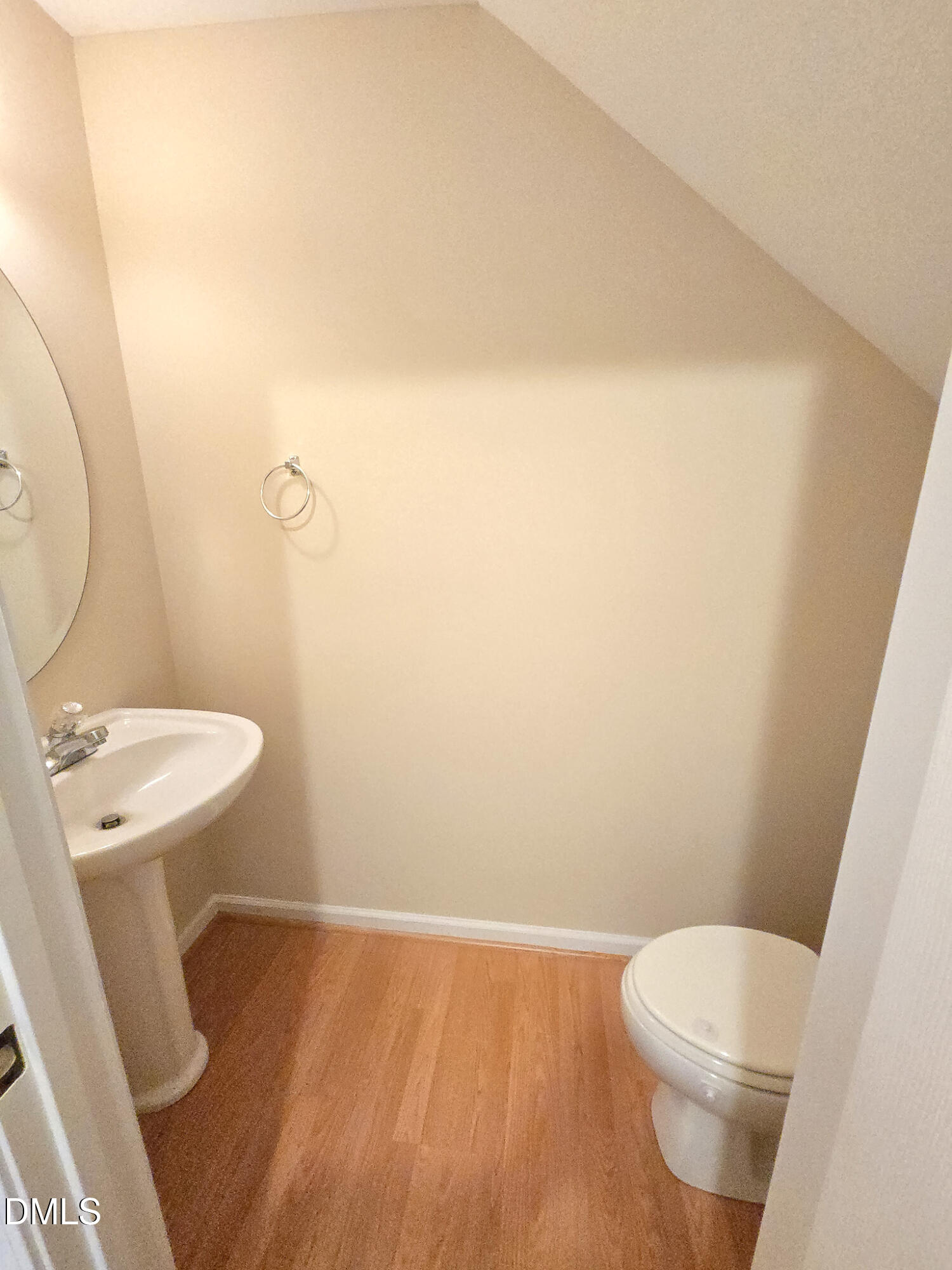 9819 Layla Avenue Raleigh, NC 27617 - Photo 15 of 35 a bathroom with a sink and a toilet