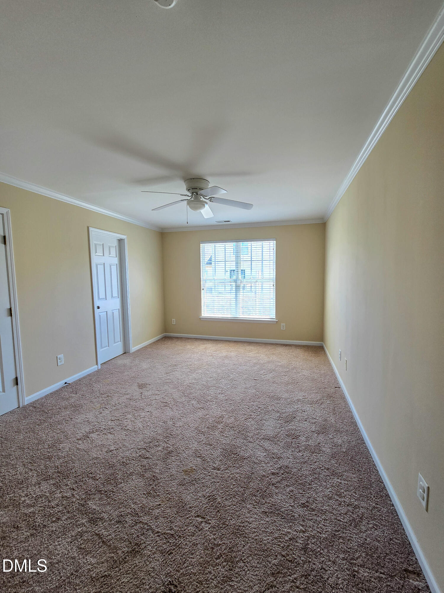 9819 Layla Avenue Raleigh, NC 27617 - Photo 17 of 35 an empty room with windows