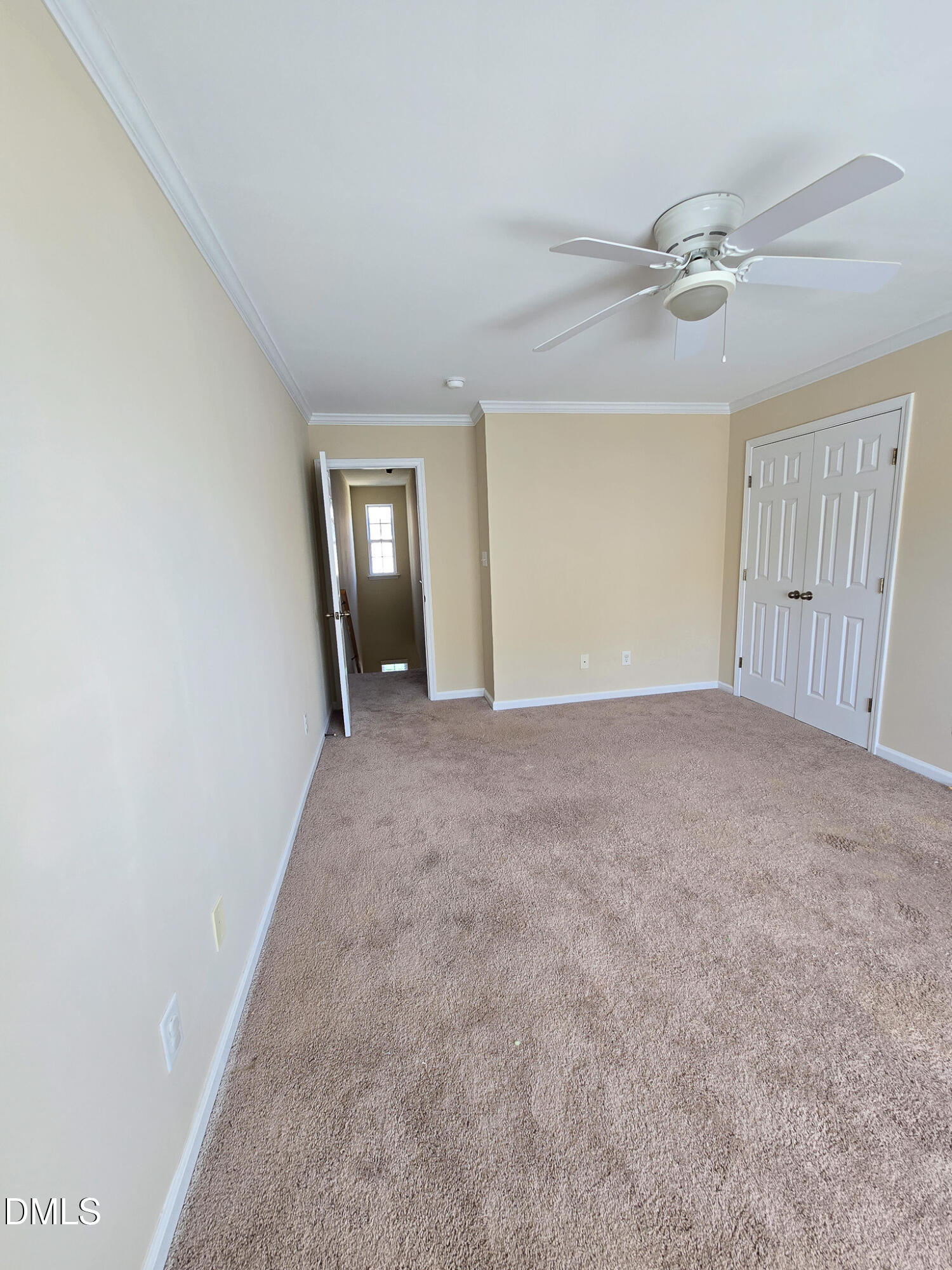 9819 Layla Avenue Raleigh, NC 27617 - Photo 18 of 35 a view of an empty room with a window