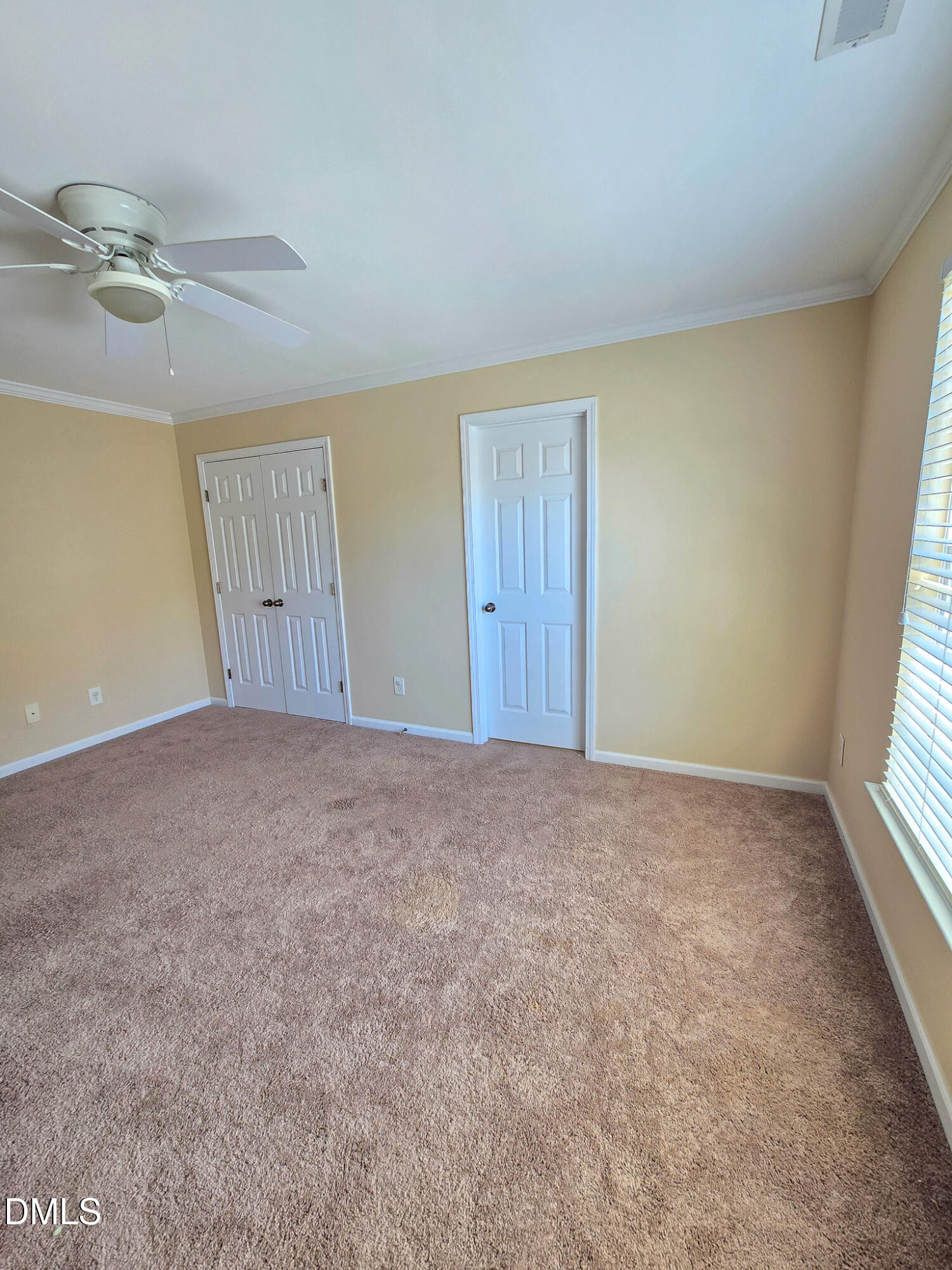9819 Layla Avenue Raleigh, NC 27617 - Photo 19 of 35 a view of an empty room and a window