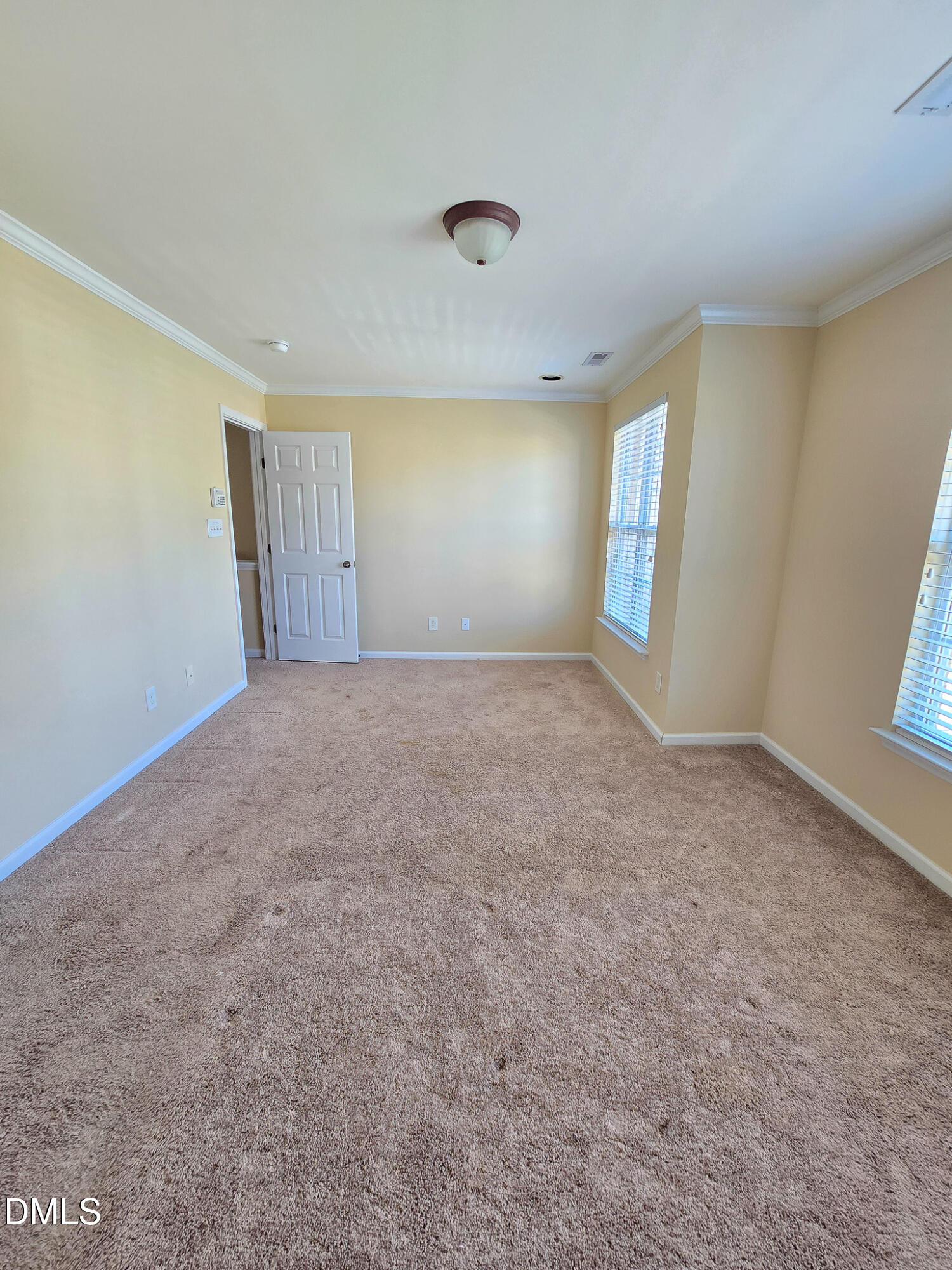 9819 Layla Avenue Raleigh, NC 27617 - Photo 25 of 35 wooden floor in an empty room with a window