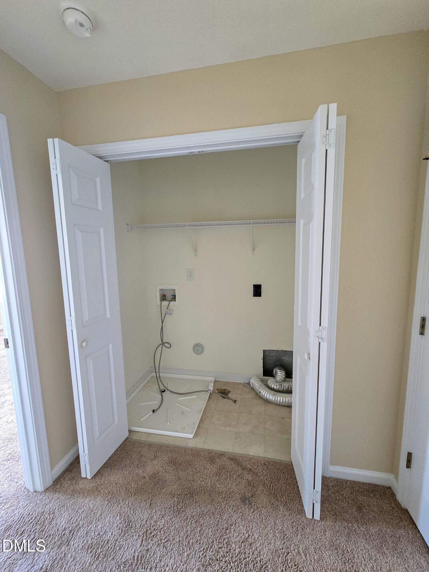 9819 Layla Avenue Raleigh, NC 27617 - Photo 31 of 35 a view of room with window and closet