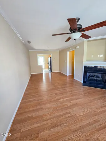 a view of a hallway with a dining room