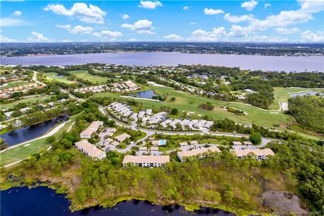 a view of lake with green space