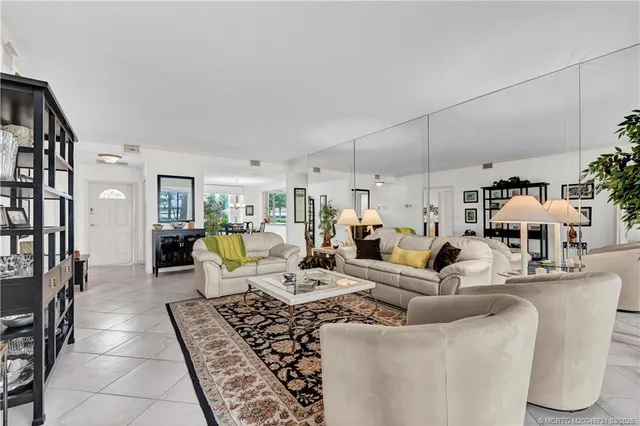 a living room with lots of furniture and appliances