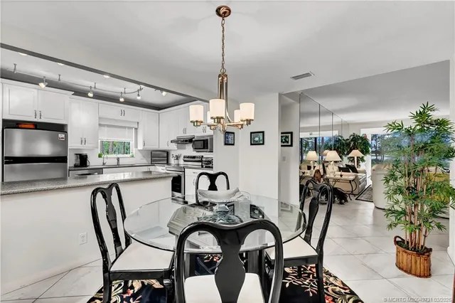 a view of a dining room and furniture