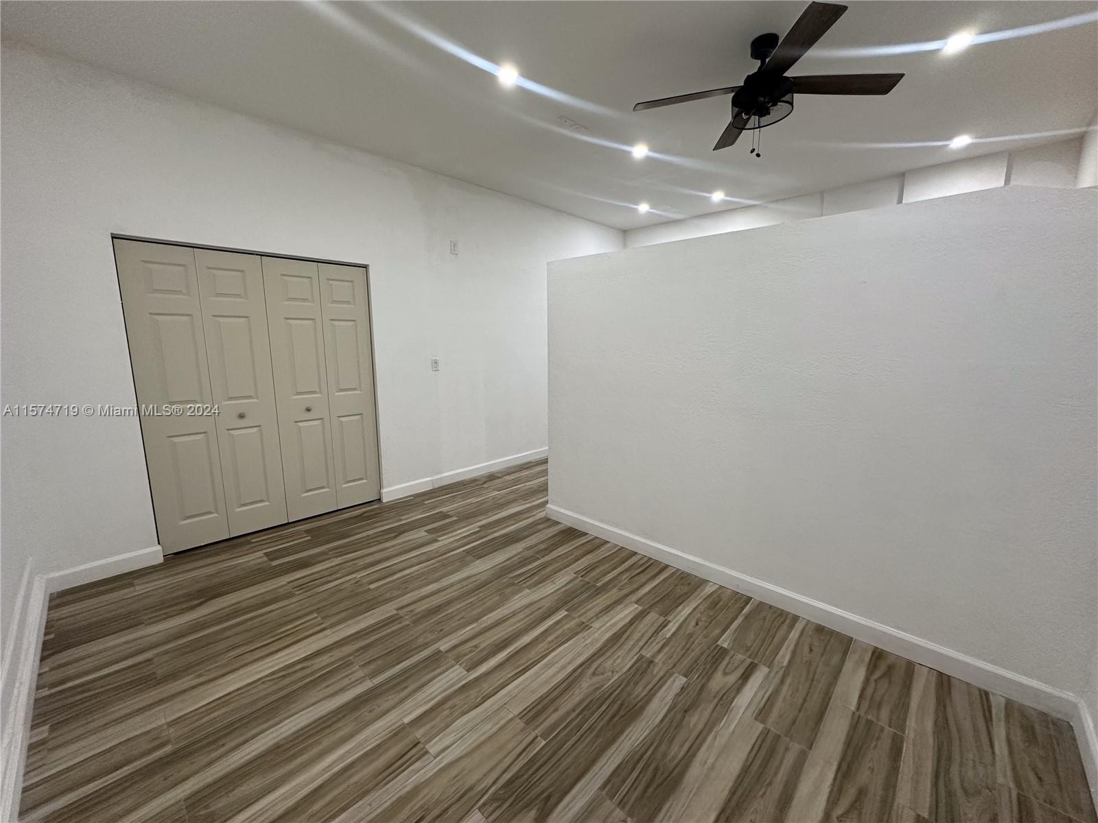 27176 Southwest 132 Ct Road, Unit 2 Homestead, FL 33032 - Photo 10 of 10 a view of a room with wooden floor