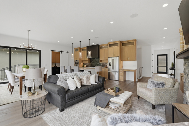 653 East Vandalay Lane Draper, UT 84020 - Photo 13 of 61 Open-concept living area featuring light wood-finish flooring throughout