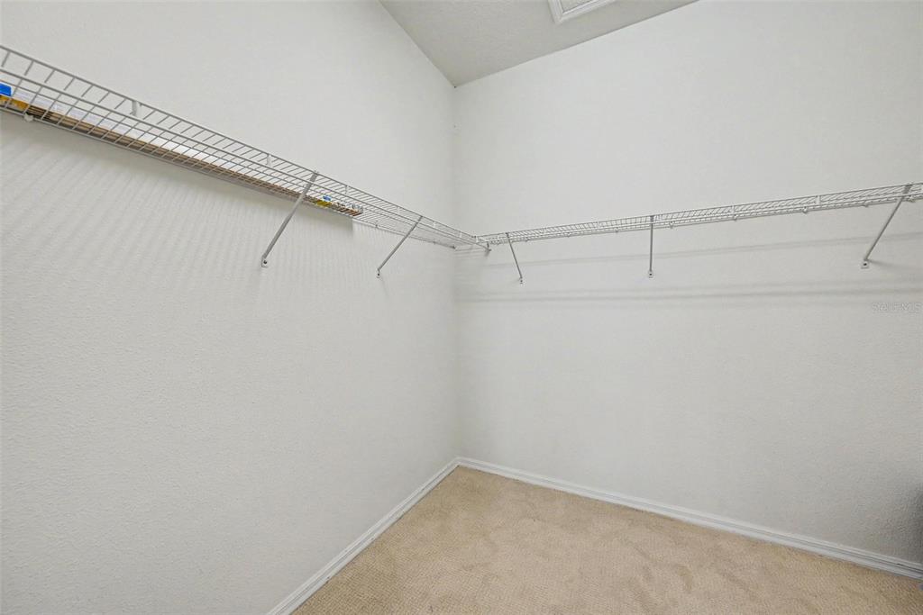 7411 Wimpole Drive New Port Richey, FL 34655 - Photo 16 of 21 a view of a room with racks on the wall