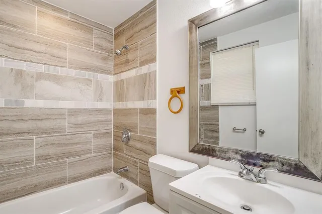 a bathroom with a sink and a shower