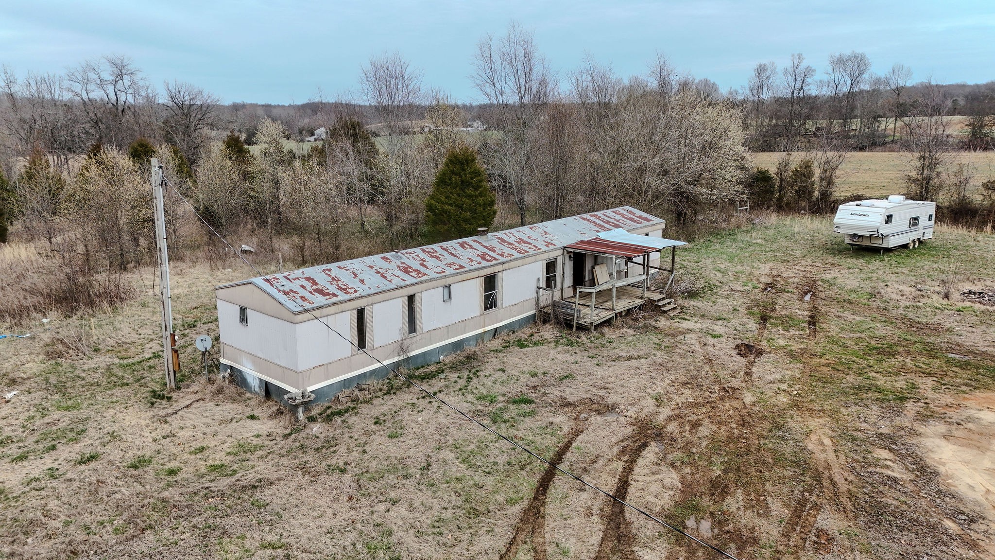 2613 Chambliss Road Pleasant View, TN 37146 - Photo 1 of 20 a view of a house with a yard and sitting area
