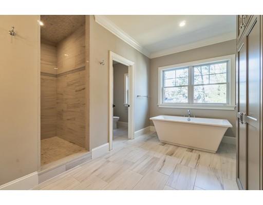 16 Woodcliffe Road Lexington, MA 02421 - Photo 19 of 30 a bathroom with a bathtub and a shower