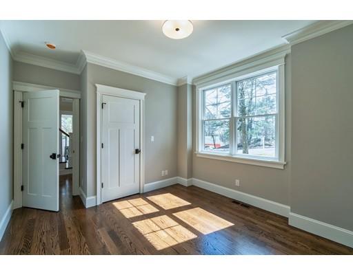 16 Woodcliffe Road Lexington, MA 02421 - Photo 23 of 30 a view of an empty room with wooden floor and a window