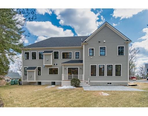 16 Woodcliffe Road Lexington, MA 02421 - Photo 29 of 30 a front view of a house with a yard