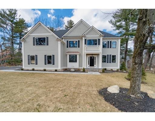 16 Woodcliffe Road Lexington, MA 02421 - Photo 30 of 30 a front view of a house with a garden