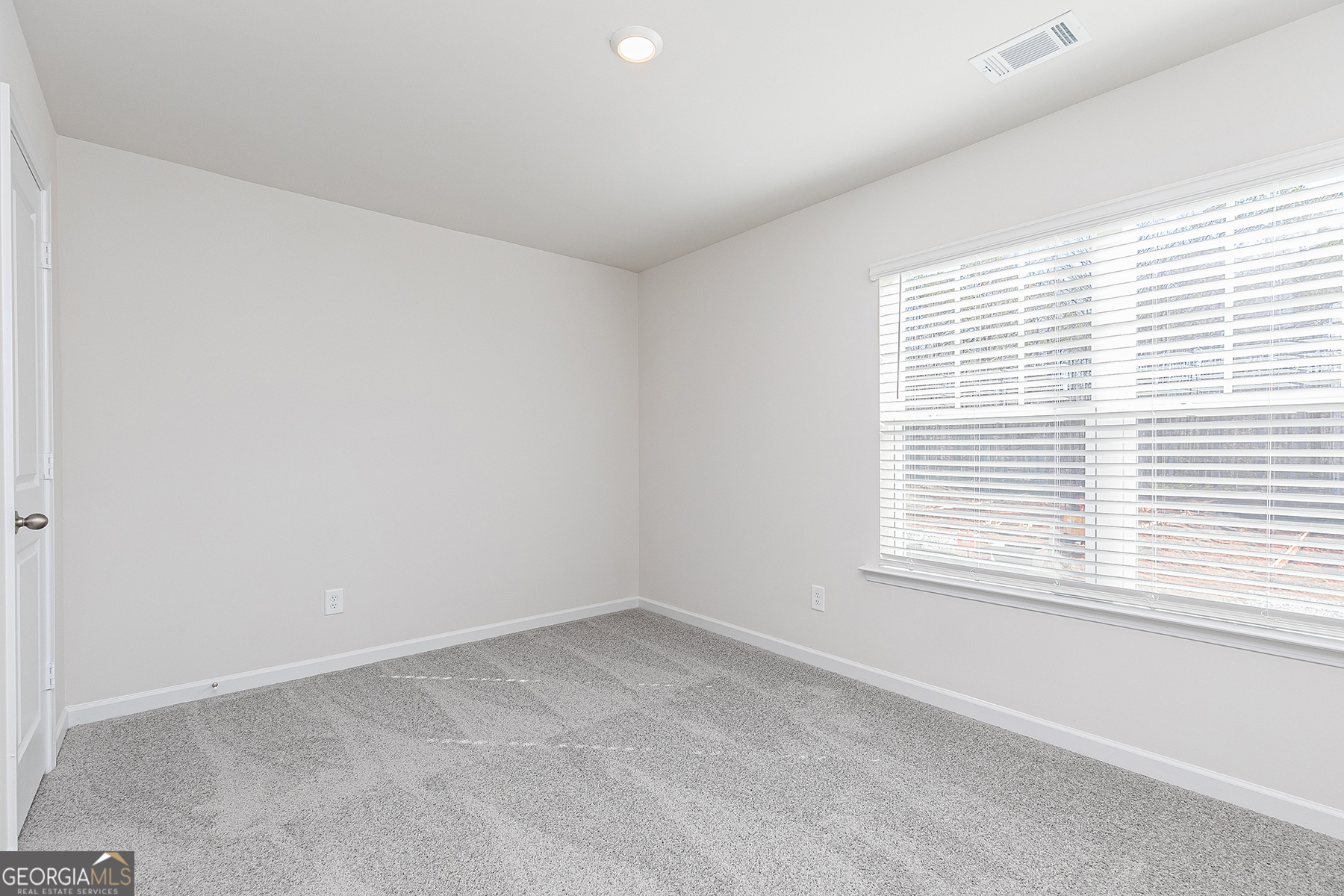 645 Mackenzie Cove Villa Rica, GA 30180 - Photo 19 of 20 an empty room with a window