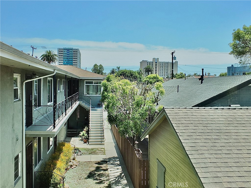 1808 East Appleton Street, Unit 7 Long Beach, CA 90802 - Photo 7 of 44 a front view of a house with a yard