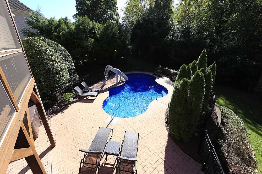 9509 Swepstone Lane Raleigh, NC 27615 - Photo 27 of 30 This home has all the options- complete privacy or every space you would need for a large crowd! Backyard
