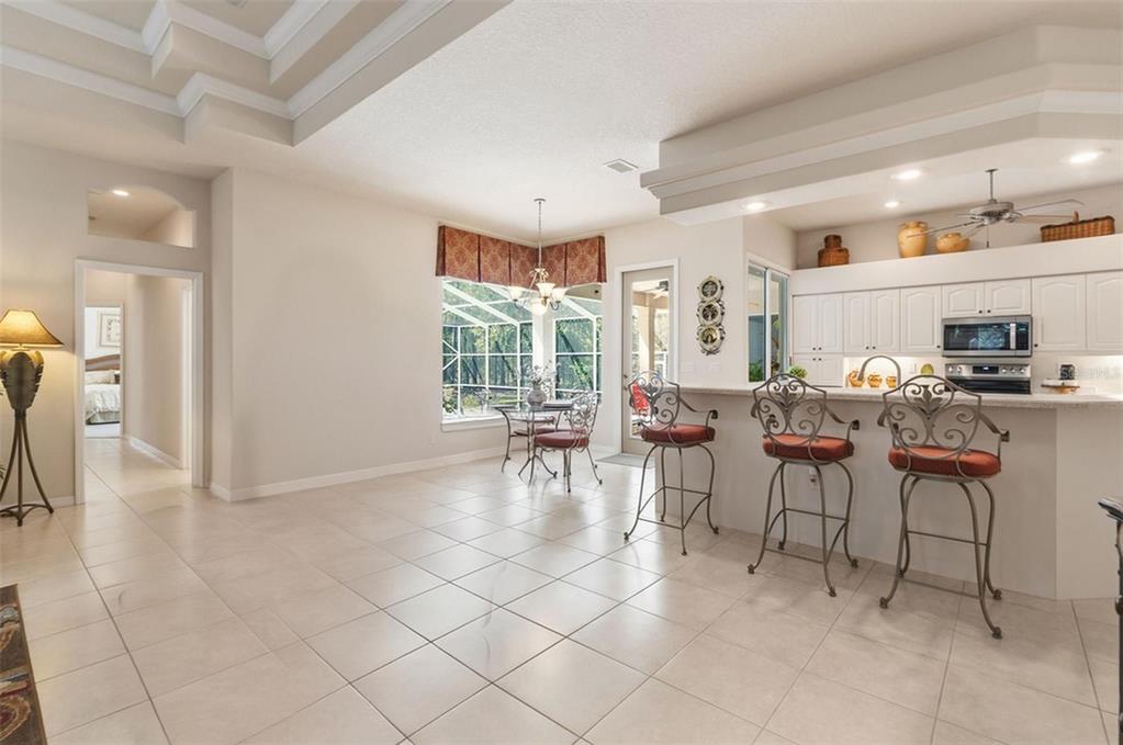 10260 Waters Edge Court Weeki Wachee, FL 34613 - Photo 21 of 58 a view of a livingroom with furniture and a window