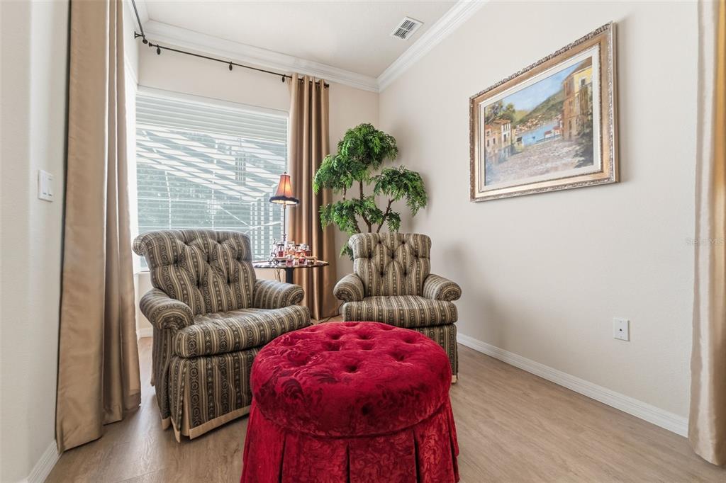 10260 Waters Edge Court Weeki Wachee, FL 34613 - Photo 29 of 58 a living room with furniture and a large window