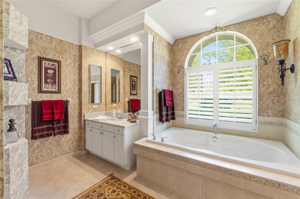 10260 Waters Edge Court Weeki Wachee, FL 34613 - Photo 31 of 58 a very nice looking rest room with a large window