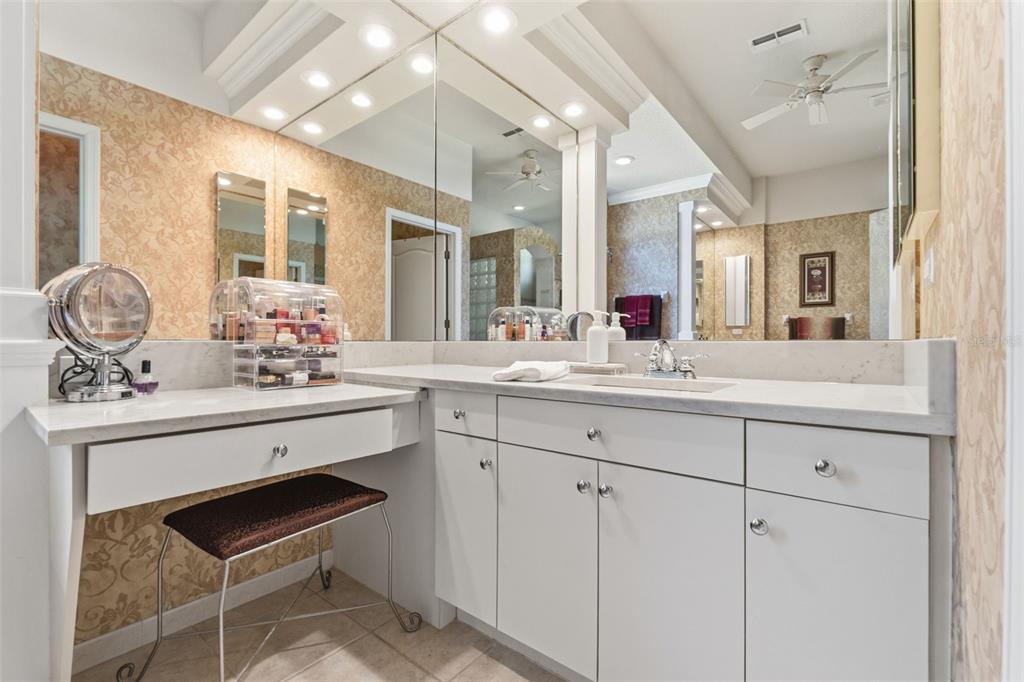10260 Waters Edge Court Weeki Wachee, FL 34613 - Photo 33 of 58 a bathroom with a sink and a mirror