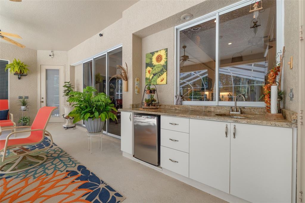 10260 Waters Edge Court Weeki Wachee, FL 34613 - Photo 45 of 58 a lobby with furniture and windows
