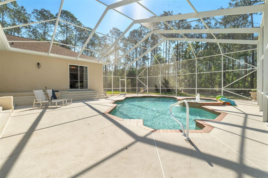 10260 Waters Edge Court Weeki Wachee, FL 34613 - Photo 5 of 58 a house view with a outdoor space