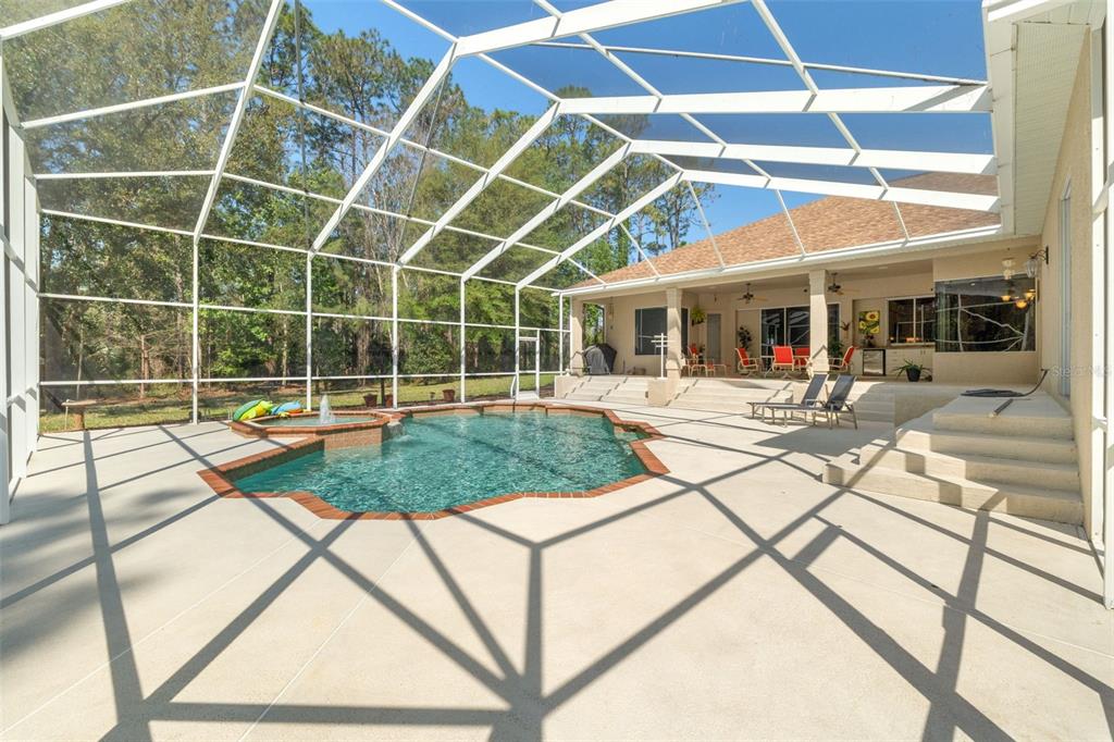 10260 Waters Edge Court Weeki Wachee, FL 34613 - Photo 6 of 58 a view of a house with sitting area and garden