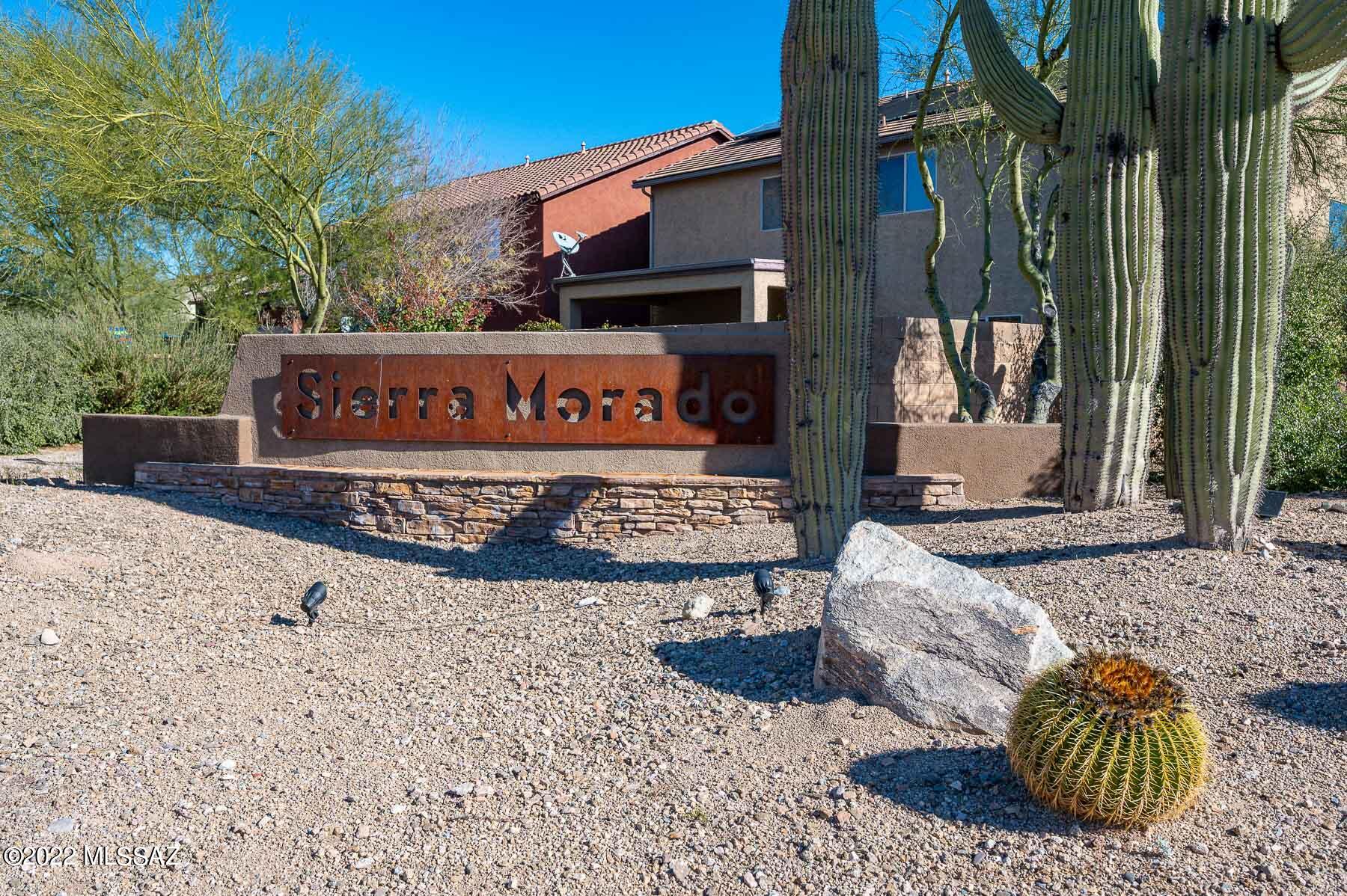 10804 East Salsabila Road Tucson, AZ 85747 - Photo 8 of 50 a view of a street with potted plants