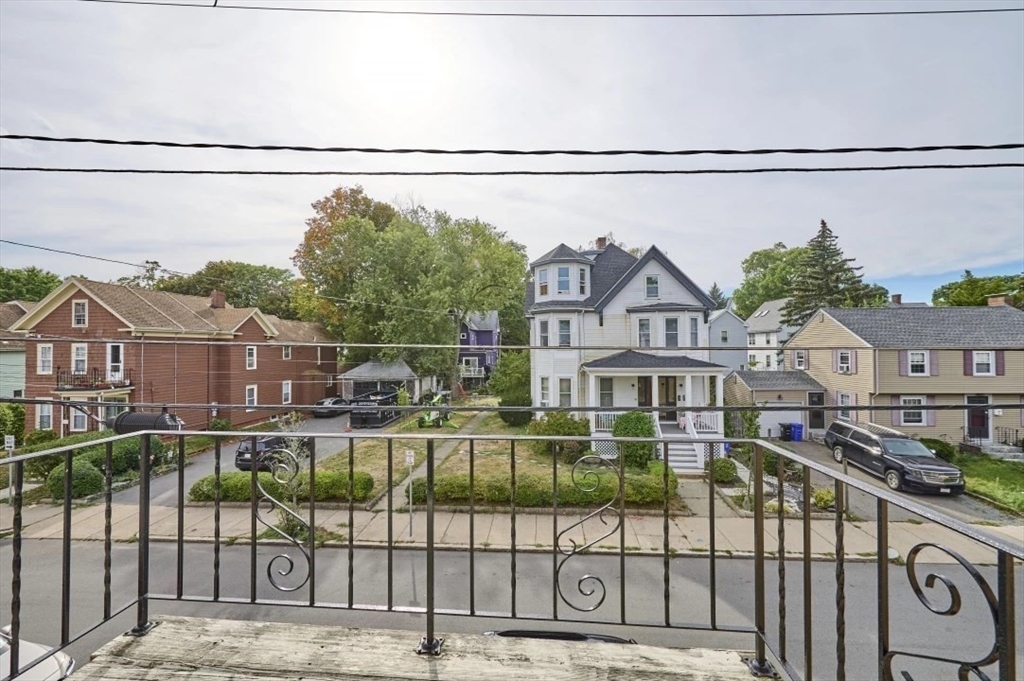 87 Cedar Street, Unit 10 Malden, MA 02148 - Photo 16 of 16 a view of a houses with a street