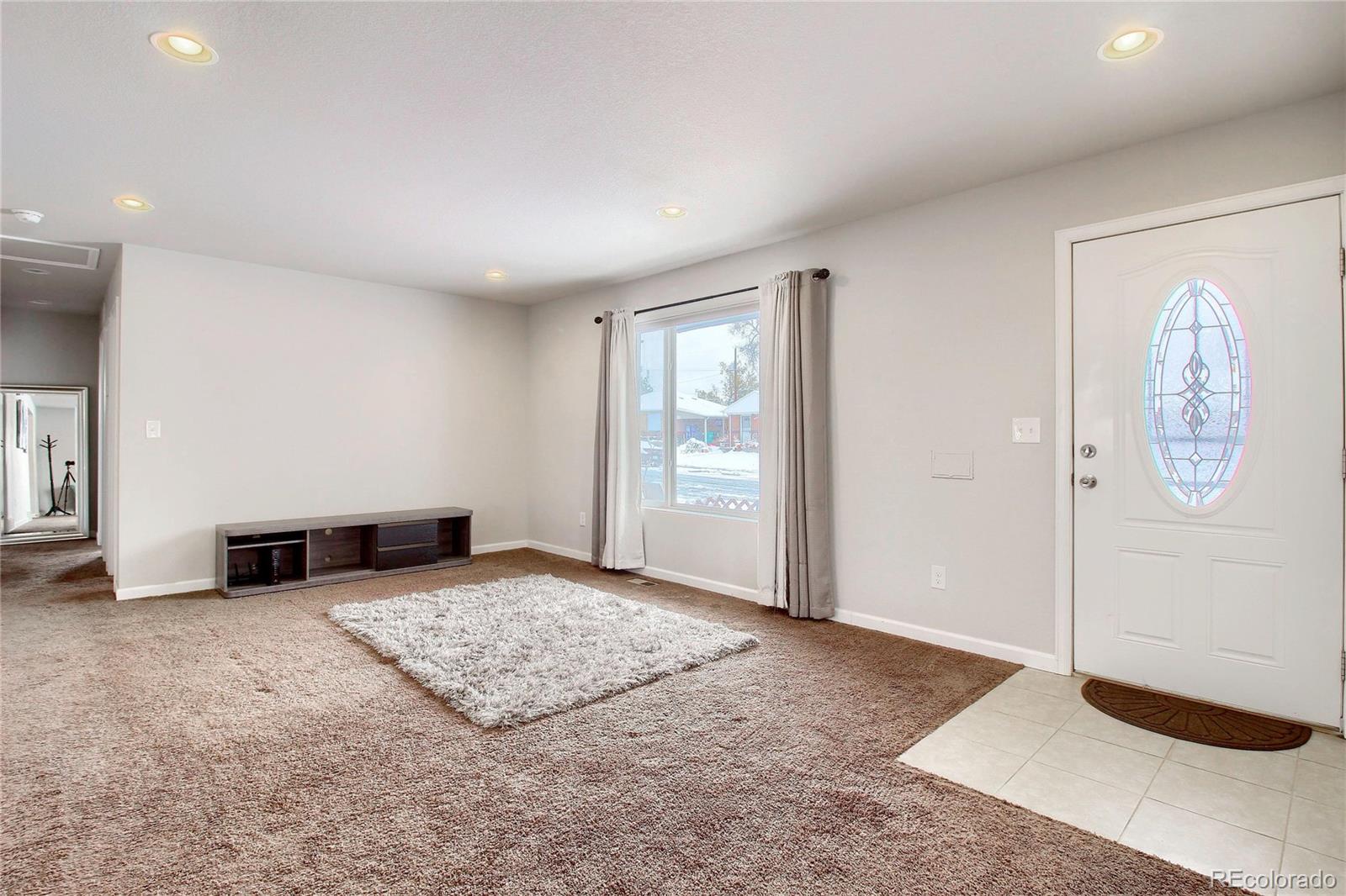 7545 Turner Drive Denver, CO 80221 - Photo 5 of 38 a view of an empty room and window