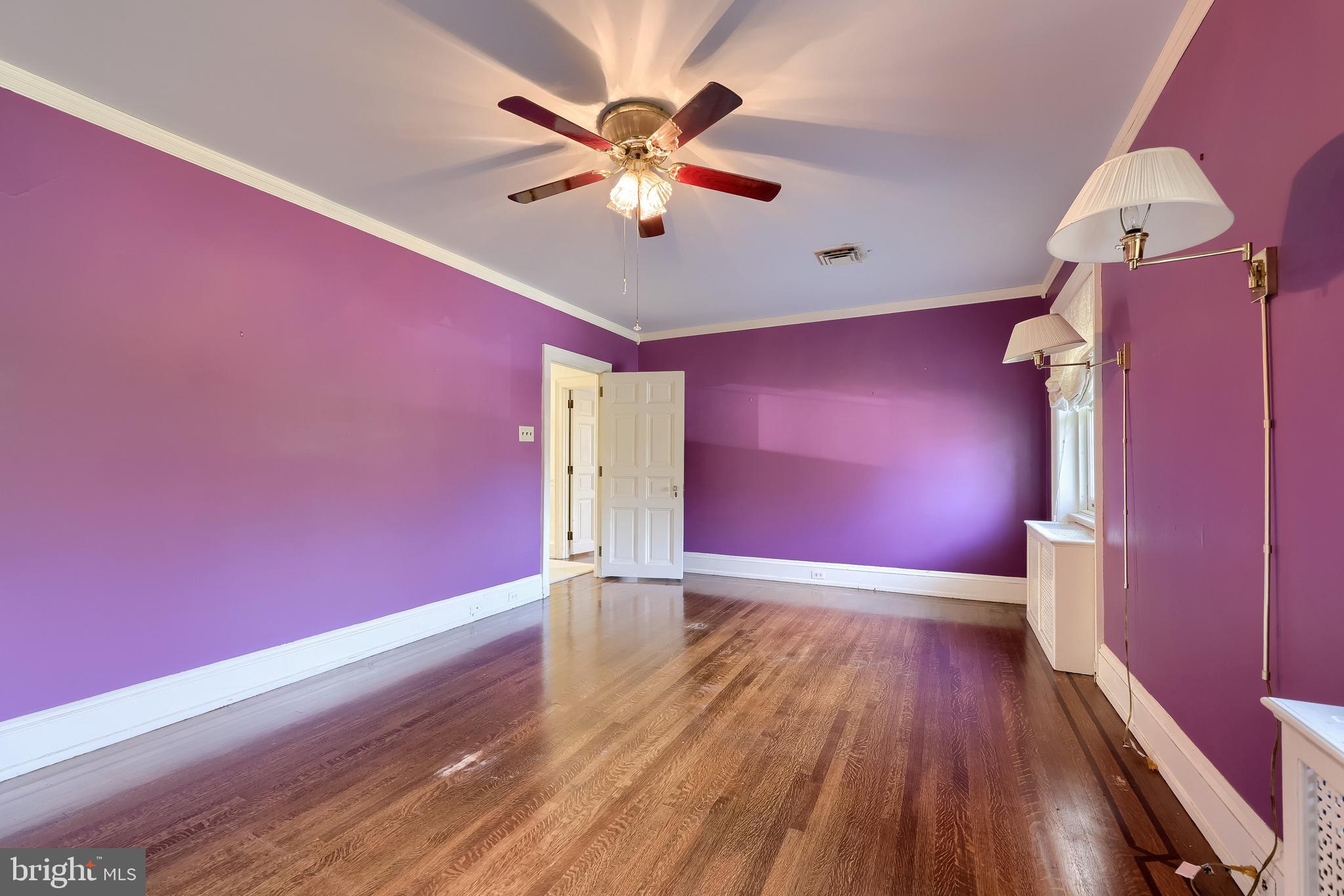 146 East Springettsbury Avenue York, PA 17403 - Photo 26 of 47 wooden floor in an empty room with a window