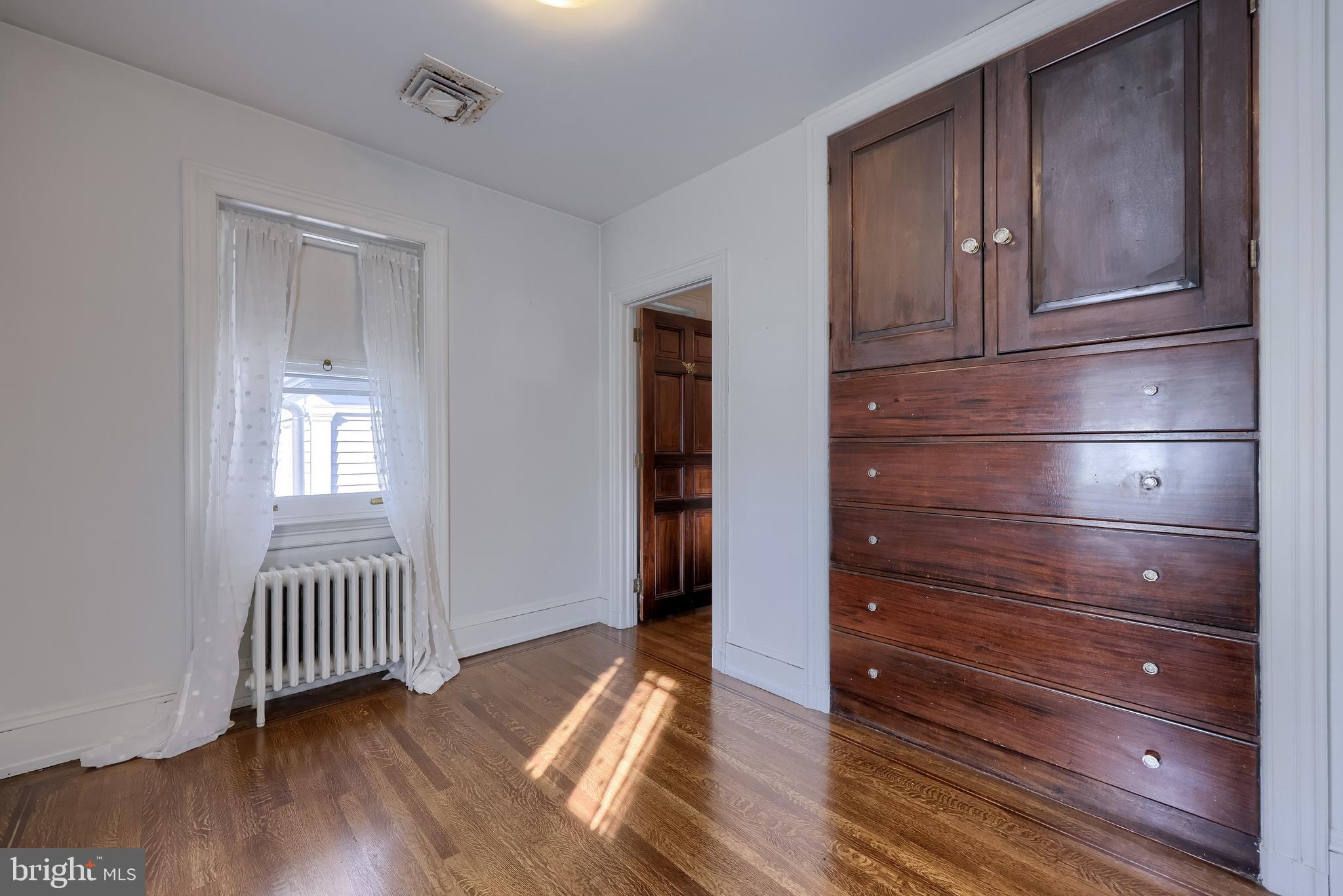 146 East Springettsbury Avenue York, PA 17403 - Photo 30 of 47 a view of a hallway with wooden floor and closet