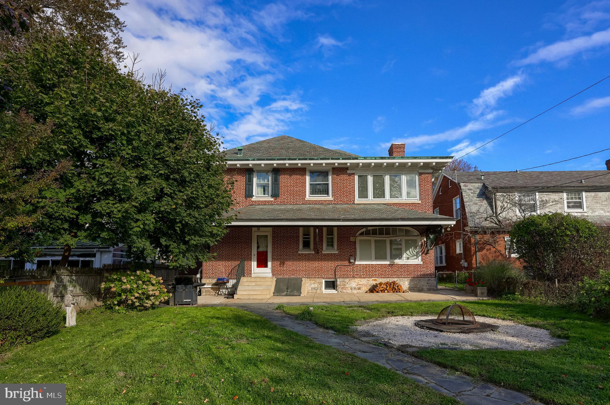 146 East Springettsbury Avenue York, PA 17403 - Photo 43 of 47 a front view of a house with a garden