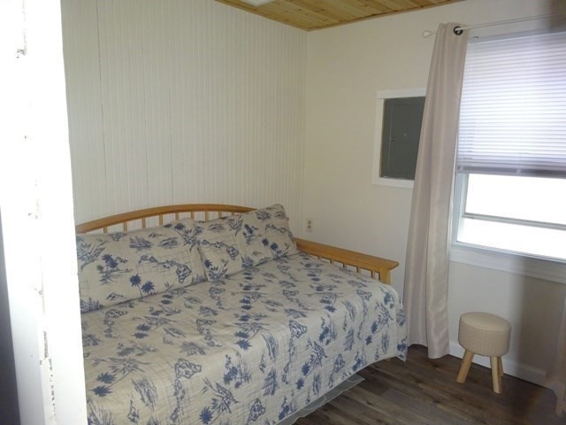 83 Shore Avenue, Unit 83 Wareham, MA 02571 - Photo 18 of 32 a bedroom with a bed and a window