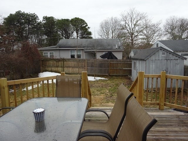 83 Shore Avenue, Unit 83 Wareham, MA 02571 - Photo 23 of 32 a view of a balcony with two chairs