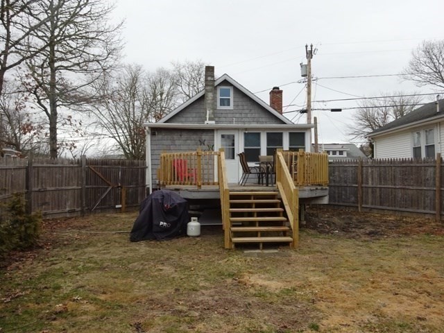83 Shore Avenue, Unit 83 Wareham, MA 02571 - Photo 25 of 32 a view of a house with a backyard