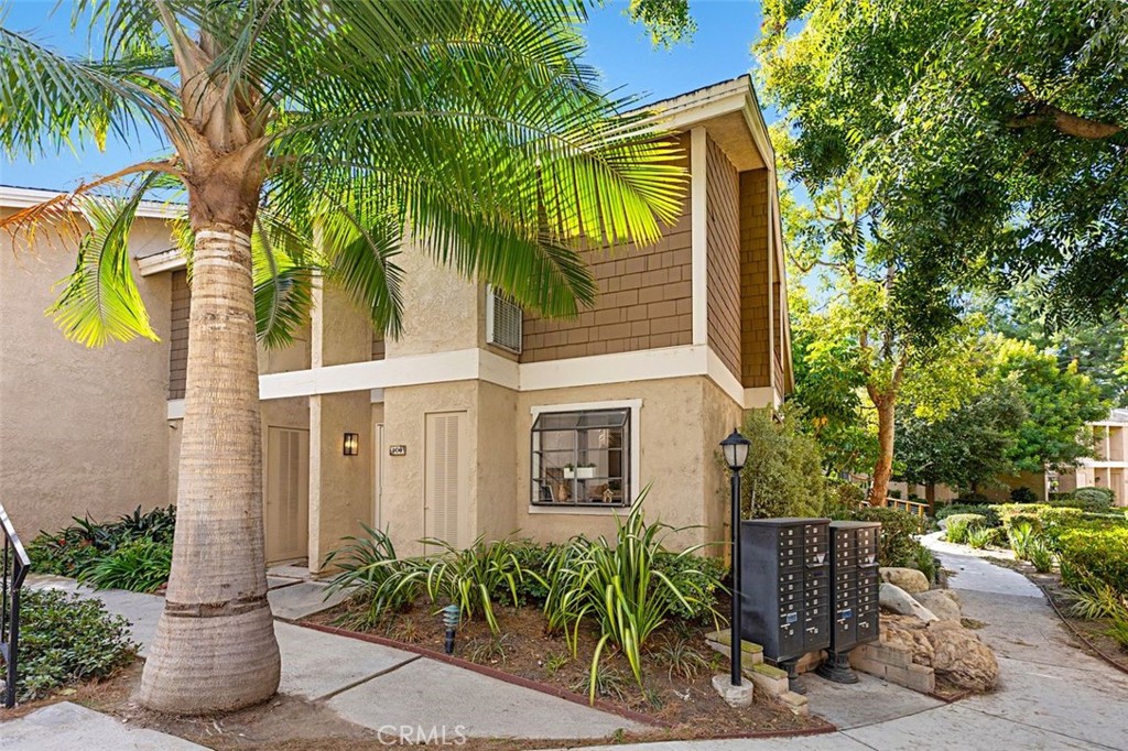 208 Pineview Irvine, CA 92620 - Photo 1 of 1 a front view of a house with a yard