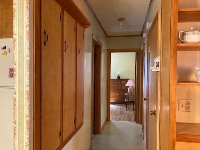 548 Point Road Hancock, ME 04640 - Photo 10 of 47 First-floor hallway w/built-ins.