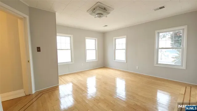 a view of an empty room and window