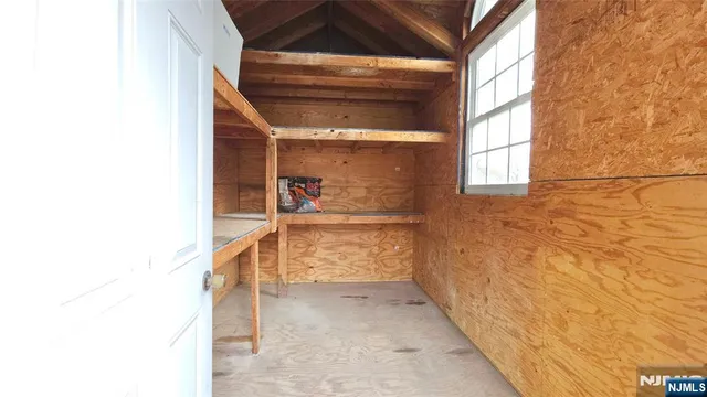 a yellow room with window