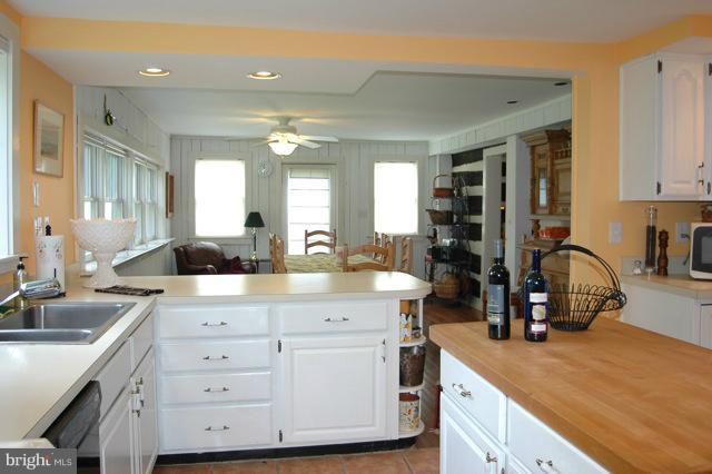 302 Little Long Mountain Road Huntly, VA 22627 - Photo 7 of 26 Kitchen Into Dining Room