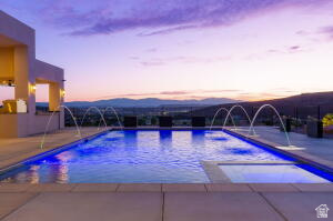 1141 East Lost Ridge Drive Washington, UT 84780 - Photo 15 of 108 Resort-style pool with integrated fountains and underwater lighting
