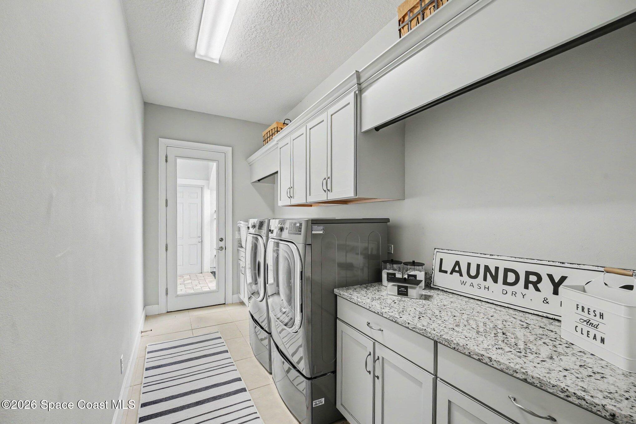 5008 Duson Way Rockledge, FL 32955 - Photo 39 of 54 Laundry to Breezeway