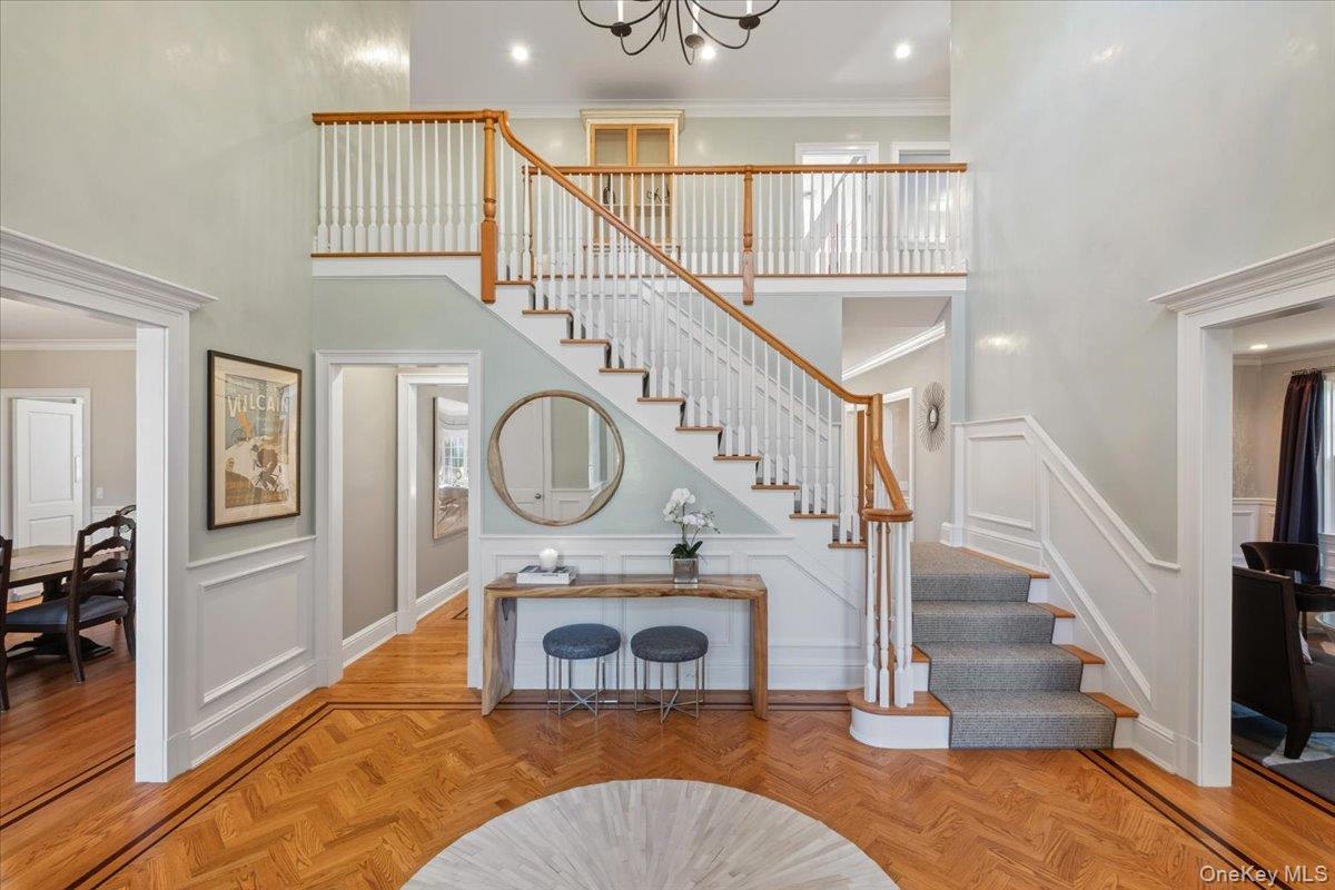 96 Brookby Road Scarsdale, NY 10583 - Photo 3 of 45 Grand Entrance Foyer with gleaming hardwood floors and double height entry