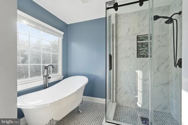 a white toilet sitting next to a bathroom