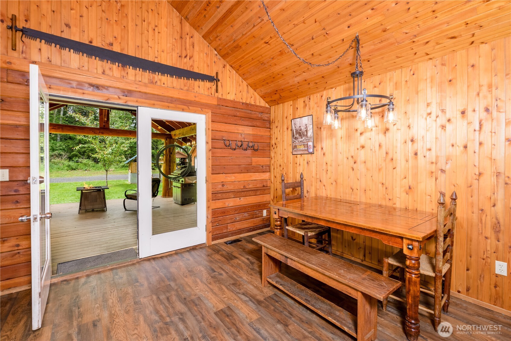 134 Bishop Road Port Angeles, WA 98363 - Photo 11 of 38 a view of a room with wooden floor and iron stairs